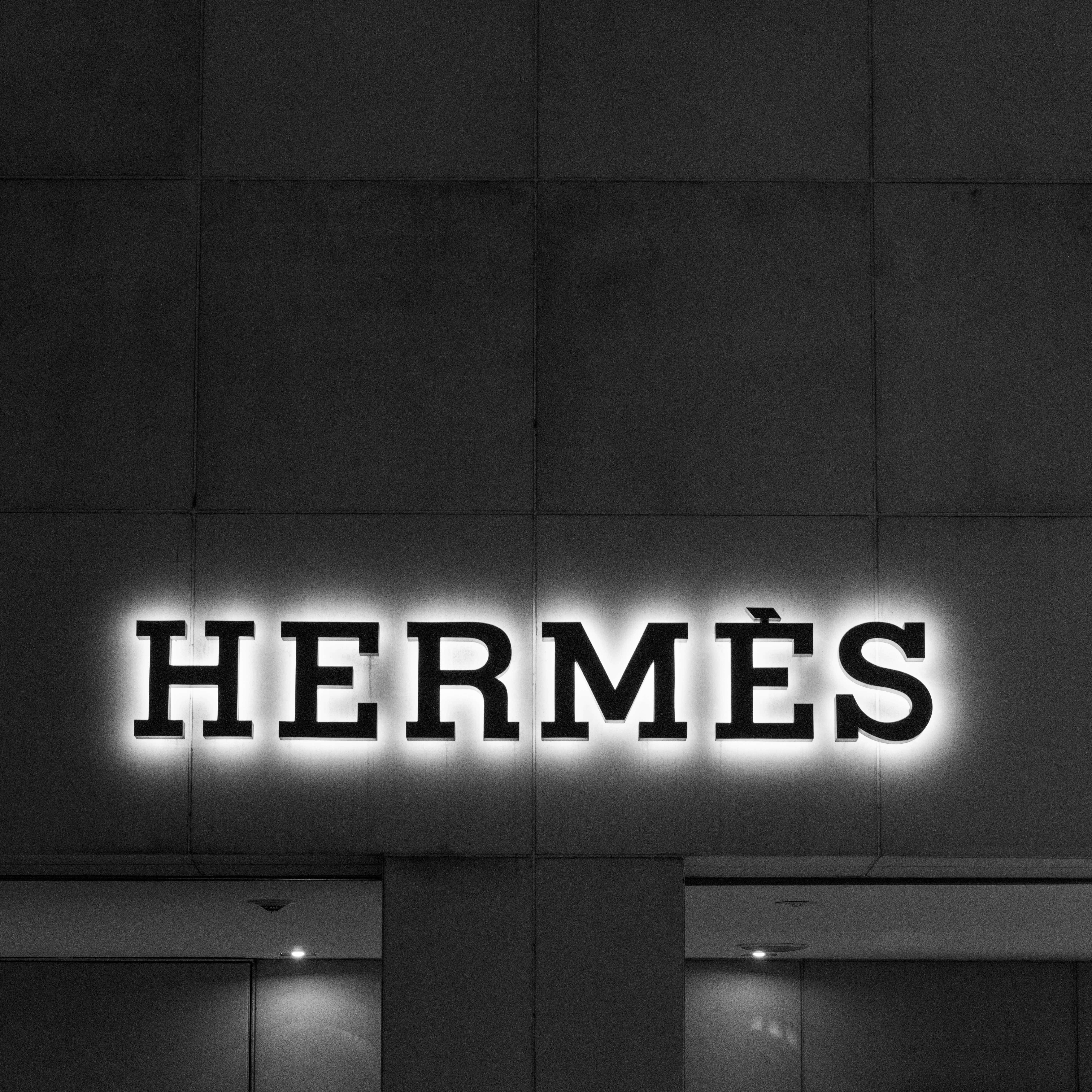 Hermes store sign representing luxury fashion and couture